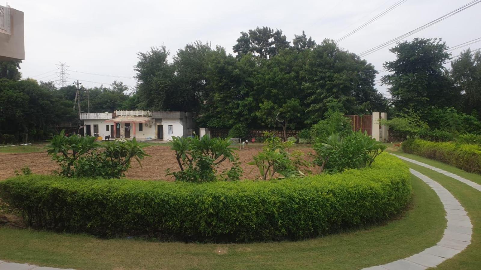 Hotel Maharaja Farms à Gurgaon Extérieur photo